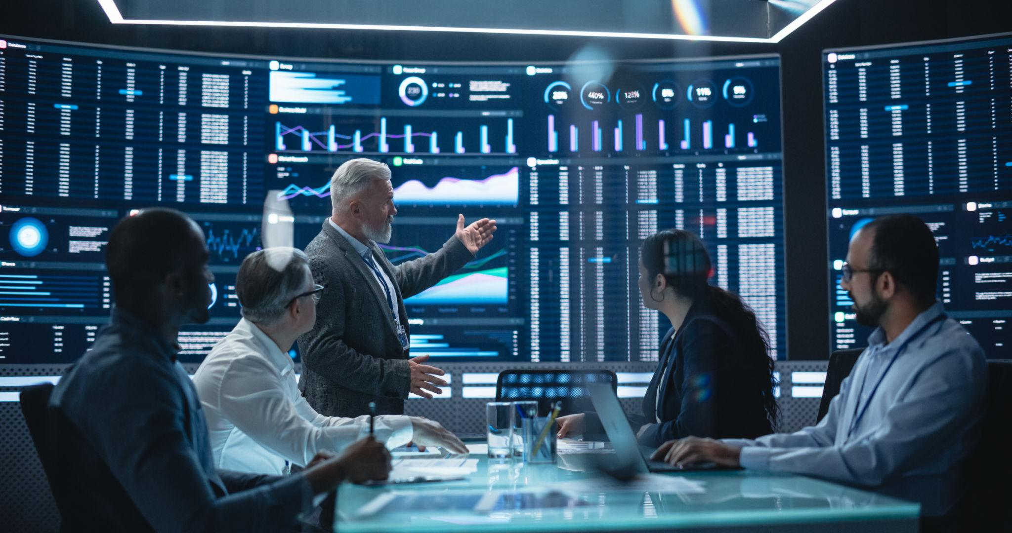 Investment analysts reviewing fund performance in a research meeting
